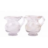 A fine pair of Cork crystal Water Jugs, early 19th Century, by Terrace Glassworks, Cork by one of