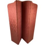 A four fold salmon coloured fabric covered Screen, 175cms x 168cms (69" x 66"). (1)