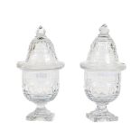 A good pair of late Georgian Irish cutglass Urns & Covers, each domed cover with a spear point