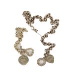 A silver Ladies matching link Chain and Bracelet, by Tiffany & Co., each with love heart charms,