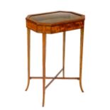 An attractive 19th Century inlaid and crossbaned Bijouterie Table, the octagonal hinged top