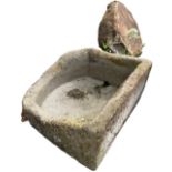 A small 19th Century granite Water Trough, of natural shape, 63cms x 61cms (25" x 24"); together