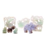 Three small pierced green jade Bird Pendants, approx. 6cms (2 1/2"), a small jade Elephant, a pair