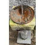 A carved granite Pedestal, with square top with circular cast metal sundial with gnomon, 94cms (