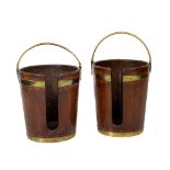 A pair of Irish Georgian mahogany Plate Buckets, of latted form with plain brass drop handles and