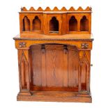 A late Victorian pitch pine Gothic Revival Sacristy Sideboard, with breakfront top with cupboard