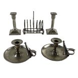A pair of silver plated Chamber Candlesticks and snuffers, a pair of spiral reeded and leaf cast