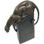 An attractive contemporary bronze Sculpture of a Panther, perched on a rock, on a tall base, bears