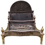 A 19th Century brass and steel Fire Grate, the sunburst design back over a shaped basket, with