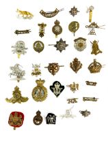 Militaria: An important collection of Military Badges, etc. to include:  Desert Rats (2); Duke of