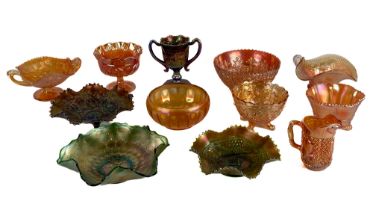 A collection of colourful moulded Carnival Glass, comprising various bowls, dishes, vase and jug. (