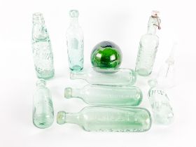 A collection of 8 Vintage green glass Soda Bottles, for Great Northern Mineral Water Co., Belfast,