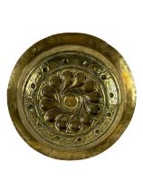 A 17th Century Nuremberg brass Alms Dish, with central floral design, approx. 30cms (12'') diameter.