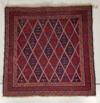 An attractive dark blue and red Persian Rug, with rows of geometric motifs, 117cms (46") square;