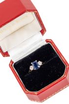 An attractive Ladies diamond and sapphire Ring, hallmarked 18ct (approx. 2.8grams) set with