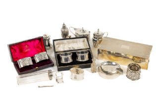 Silverware: A collection of varied silver Trinkets, including two silver cased pairs of Napkin