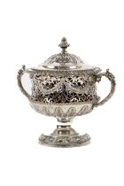 A fine Chester cast silver two handled Cup and Cover,  pierced with scrolling foliage and overlaid