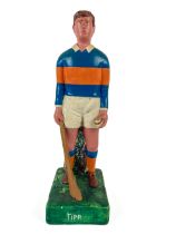 G.A.A.: a hand painted plaster Figure of a hurler, "Tipp" (Tipperary), in upright position with