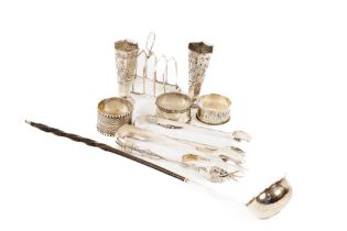 A George III English silver Sugar Tongs, another larger Victorian silver ditto, a small Birmingham
