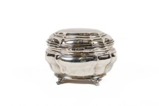 A good silver bombe shaped Sugar Casket, with hinged cover raised on four short legs, by