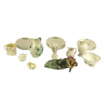 A collection of Belleek Ware, include a First Period rope handled Jug, a First Period shell shaped