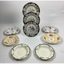 A pair of early Derby oval floral decorated Dishes, 27cms (10 1/2"), a Rockingham floral painted