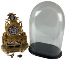 A 19th Century French gilt metal Mantel Clock, the movement by Japy Freres #1823, the oval case