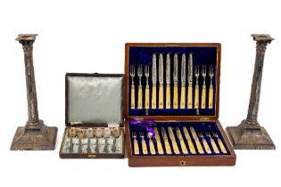 A cased set of etched silver bone handled crested Supper Knives and Forks, in wooden case, with