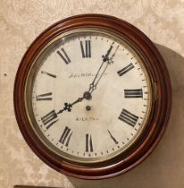 A Victorian mahogany framed circular dial Wall Clock, with glazed and brass rimmed door, by