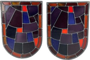 A good pair of arch top leaded and coloured stain glass Panels, 55cms x 38cms (21 1/2'' x 15''). (2)