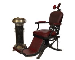 A heavy cast iron Vintage Dentist's Armchair, with adjustable seat and back, padded seat back and