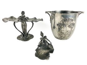 A good Art Nouveau pewter Champagne Bucket, with two handles and decorated with flowers in relief,