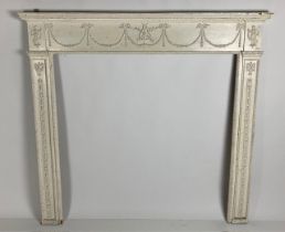 A 19th Century attractive carved and painted Adams style Fire Surround, the shelf with beaded