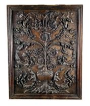 A pair of Gothic style carved oak upright Panels, decorated in the typical taste, each approx. 68cms