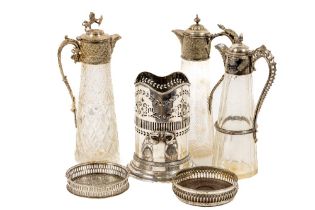 Three similar cutglass Claret Jugs, each with ornate silver plated mounts, all approx. 30cms (12")