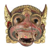 A carved polychrome and parcel gilt Mask, Indonesia, Ramayana, 27cms (10 1/2"). (1)