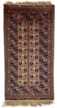 A Moroccan patchwork pattern Rug, with rows of squares, gulls etc., inside a triple band border,