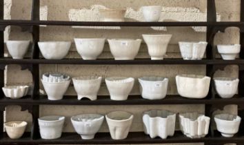 A collection of approx. 23 white pottery Jelly Moulds. (23)