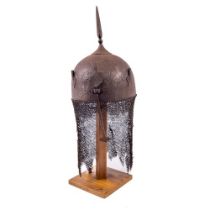 A fine Persian Helmet (Kulah Khud), 19th Century with spike finial on dome head chased with deer