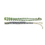 A Sterling silver Ladies Necklace, with green peridot stones inset, approx. 38cms (15'') long; a