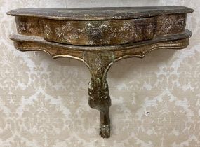 A Continental style Pier Table, with green and gilt design, embossed flowers, shaped top over frieze