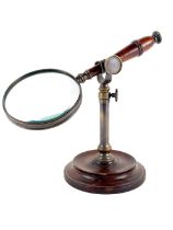 A good rosewood mahogany and brass mounted desk top Magnifying Glass. (1)