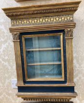 A Renaissance style gilt decorated Frame, with egg n' dart moulded cornice, reeded columns,
