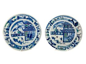 A pair of Chinese Doucai Plates, 18th Century Kangxi period, each decorated with central panels