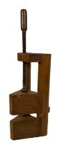 An unusual wooden Vice or Press, of triangular form. (1)