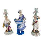 A pair of Dresden Augustus Rex figural Candlesticks, modelled with boy and girl, 27cms (10 1/2") and