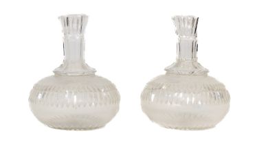 A pair of late 19th Century cutglass Water Carafes, 17cms (6 1/2'') a circular cutglass Jar and