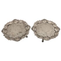 A pair of George II silver Card Trays or small Salvers, by J. McFarlane, London 1752, each chased