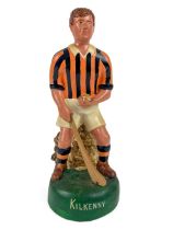 G.A.A.: A hand painted plaster Figure of a hurler "Kilkenny", holding sliotar and hurl, approx.