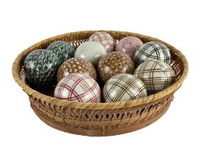 A collection of 11 porcelain Scottish and Staffordshire Carpet Balls, of various tartan style and